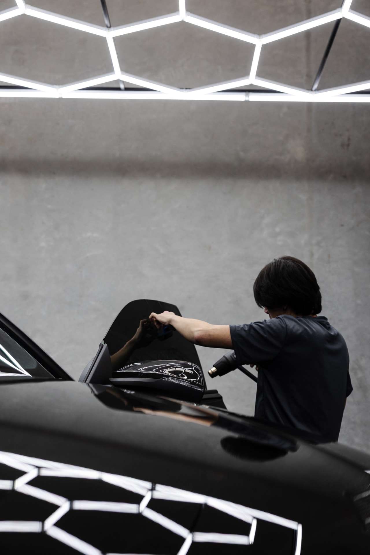 Window film being heat formed and installed inside the Wetherill Park workshop